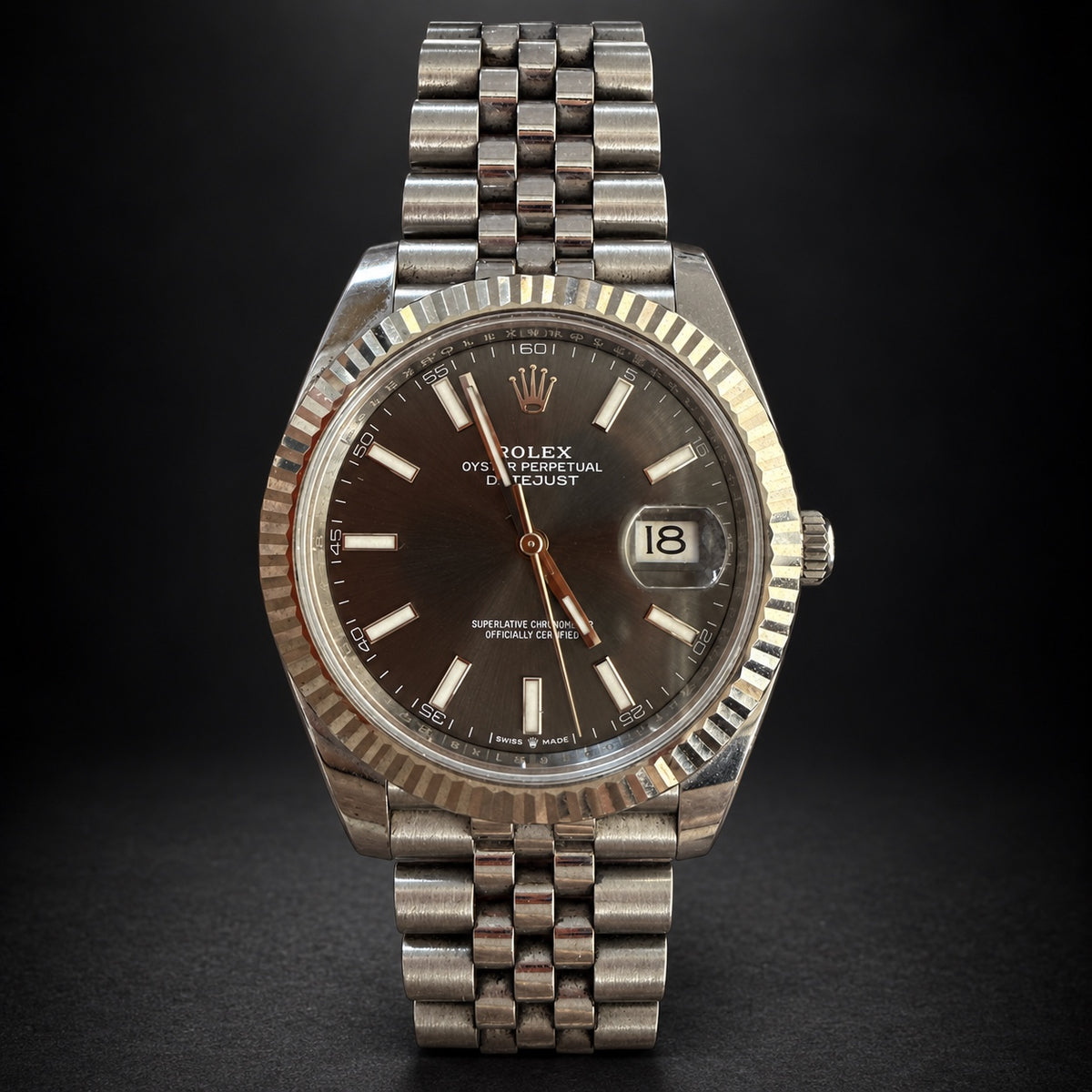 2025 Rolex Datejust with dark sunburst dial, fluted bezel and five-row bracelet