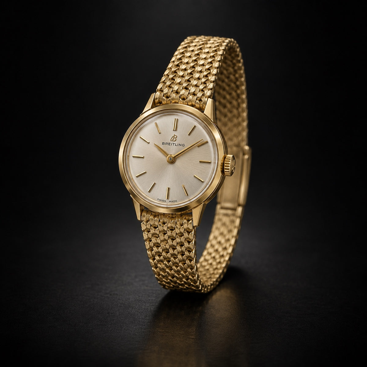Vintage Breitling ladies’ gold-tone dress watch with woven bracelet