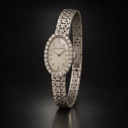 Vintage Girard-Perregaux ladies’ oval dress watch with stone-set bezel