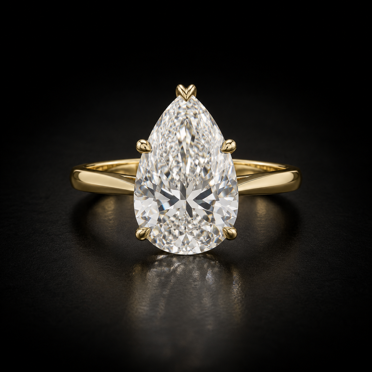 Classic Six-Prong Pear-Cut Solitaire Engagement Ring in 18kt yellow gold