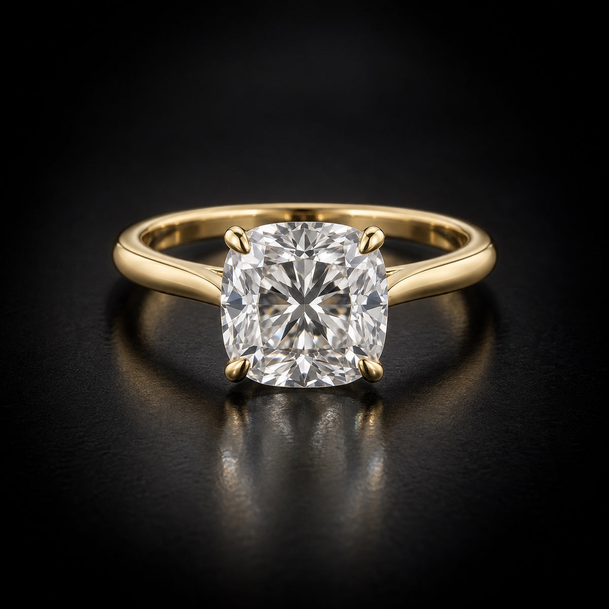 Cushion-cut solitaire engagement ring in 18kt yellow gold