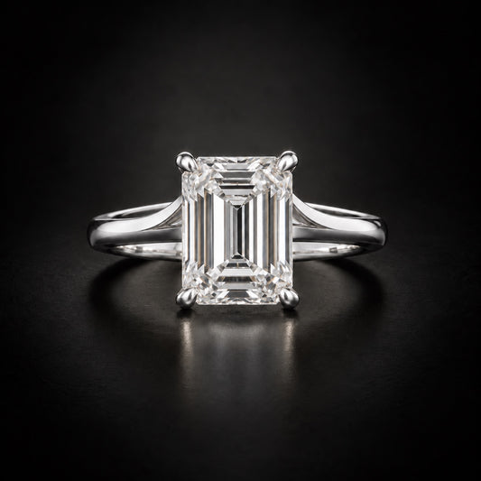 Emerald-cut solitaire engagement ring in platinum