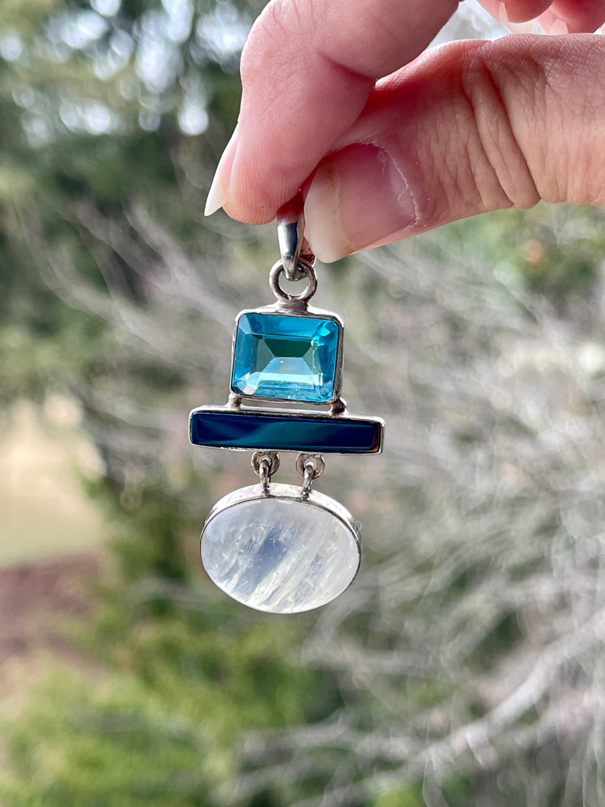 Sterling Silver Blue Topaz and White Quartz Pendant