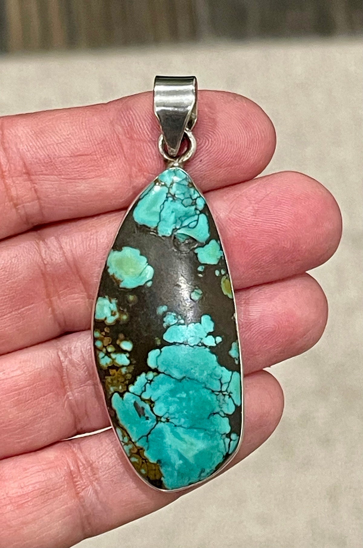 Sterling Silver Turquoise Pendant, Blue-Green Bronze Accent
