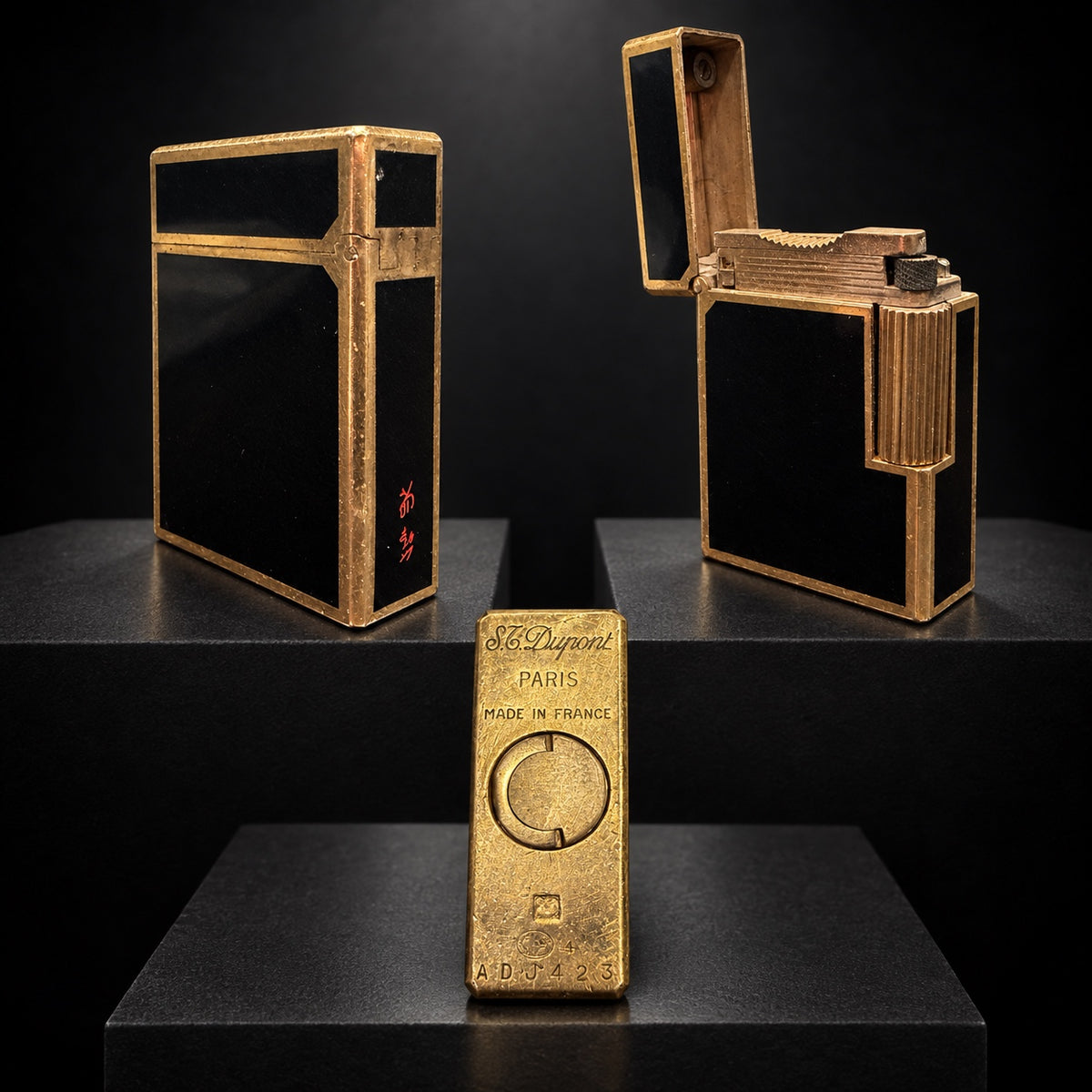 Vintage S.T. Dupont Ligne 1 Large black lacquer and gold-tone lighter, serial ADJ423, shown closed, open, and from the base