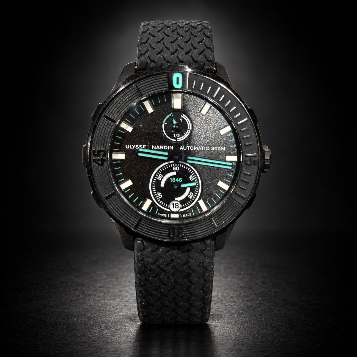 Front view of Ulysse Nardin Diver Chronometer One More Wave limited edition on black tire-tread rubber strap