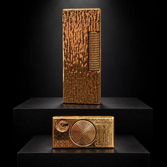 Vintage Dunhill Rollagas gold-plated bark-texture lighter with base markings, made in Switzerland